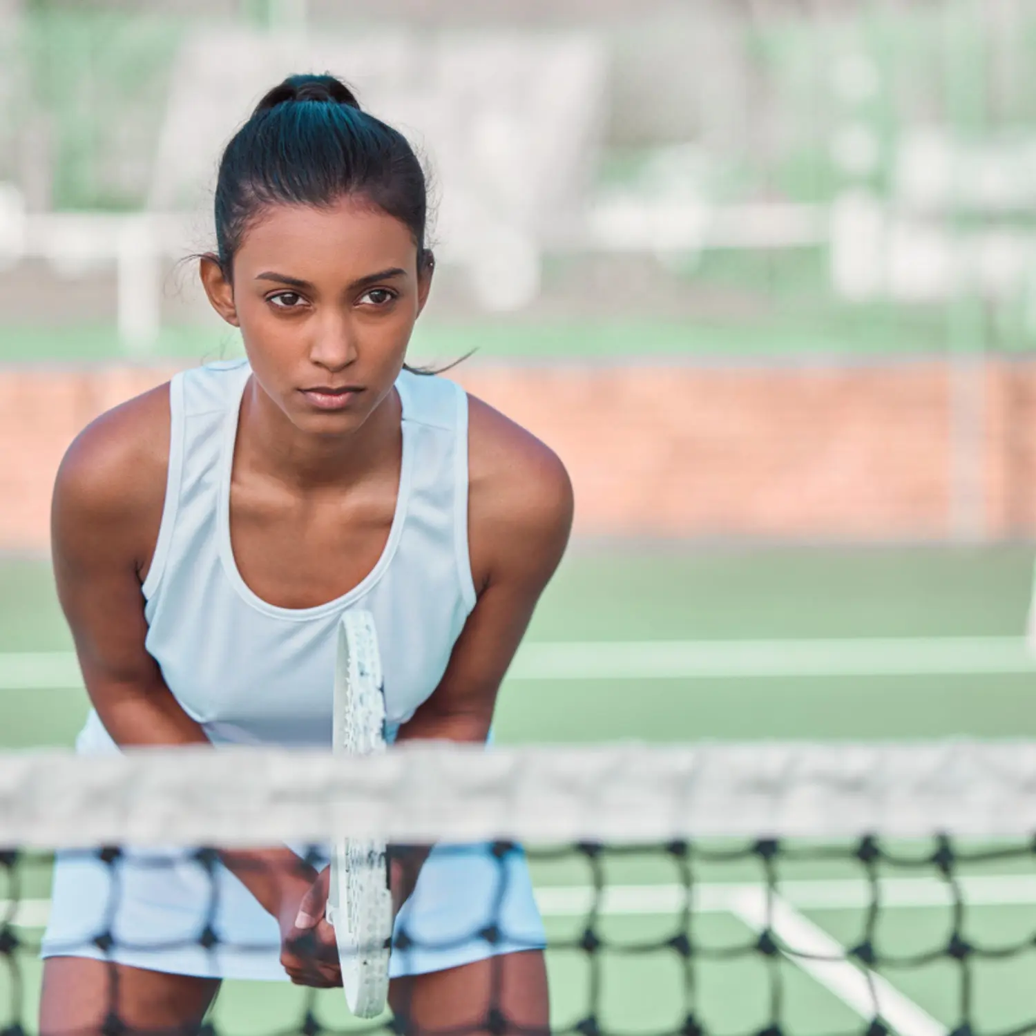 Athlete performing dynamic warm-up exercise during sports training session at Nudge Sports